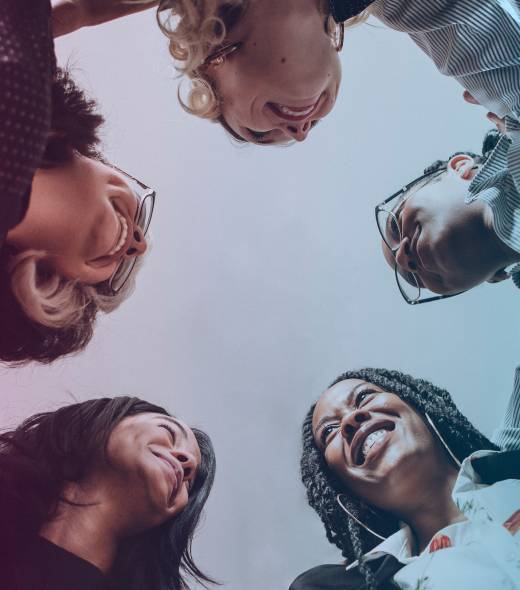 happy-diverse-businesswomen-huddling-in-the-office-2025-02-10-05-52-14-utc